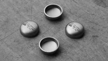 How are caps produced?